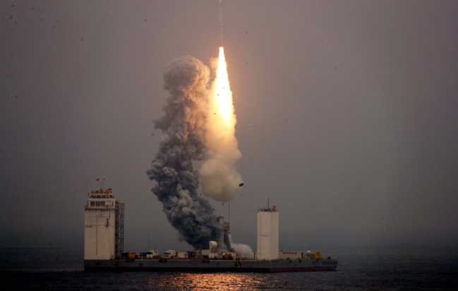 China launches first rocket into space from platform at sea