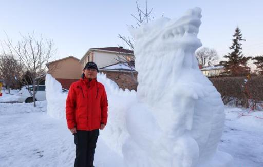 千堆雪塑腾龙 加拿大华人艺术家雪雕传递中式美学