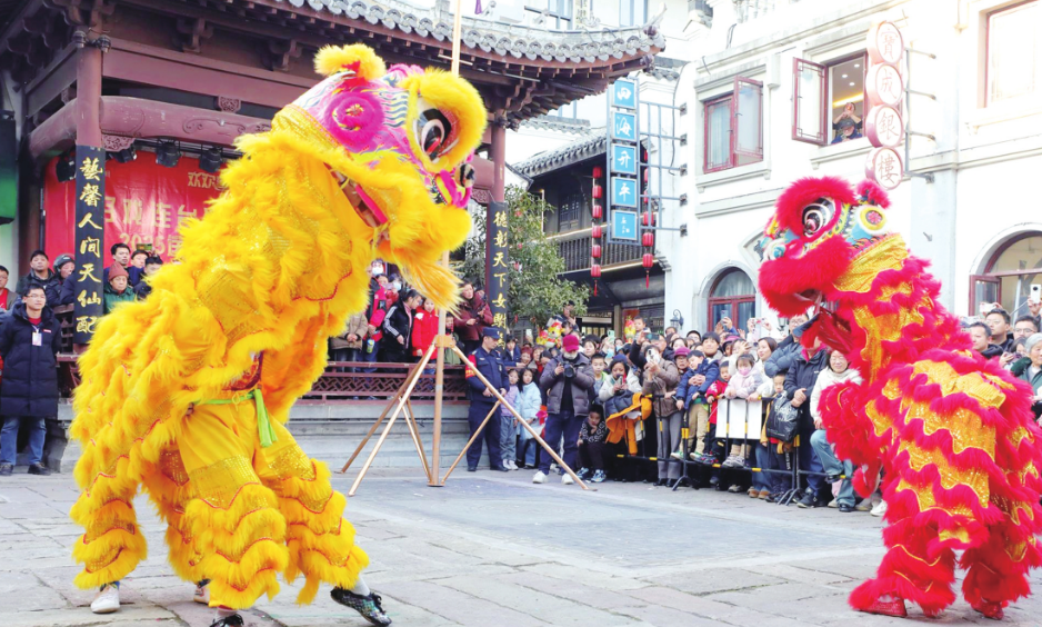 迎新春添年味 华侨华人将龙狮舞向世界